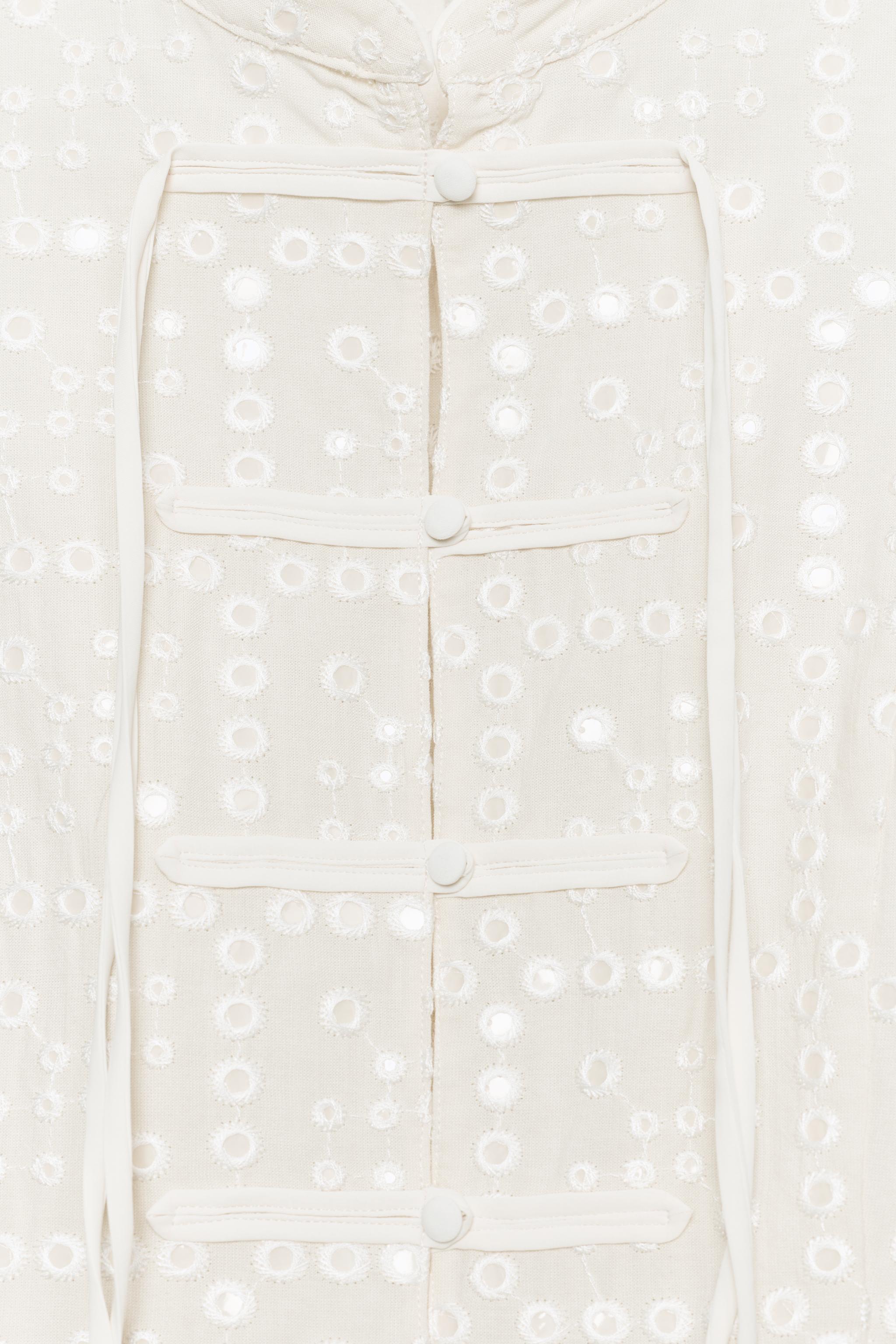 EMBROIDERED EYELET TOP WITH FIREMAN CLASPS